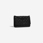 Pre-owned Chanel bag Timeless WOC Calf Black Black Side Front | Sell your designer bag on Saclab.com