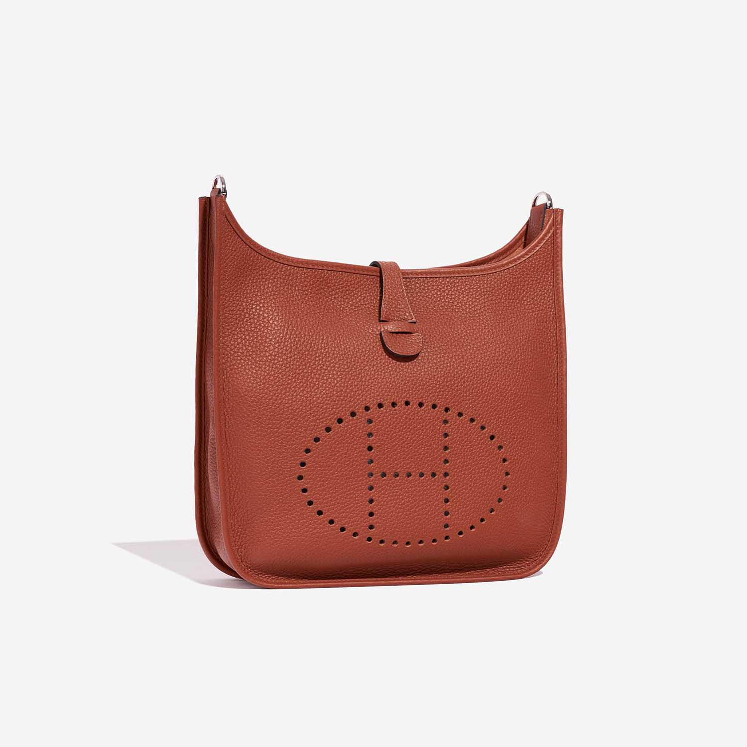 Pre-owned Hermès bag Evelyne 29 Taurillon Clemence Cuivre Orange Side Front | Sell your designer bag on Saclab.com