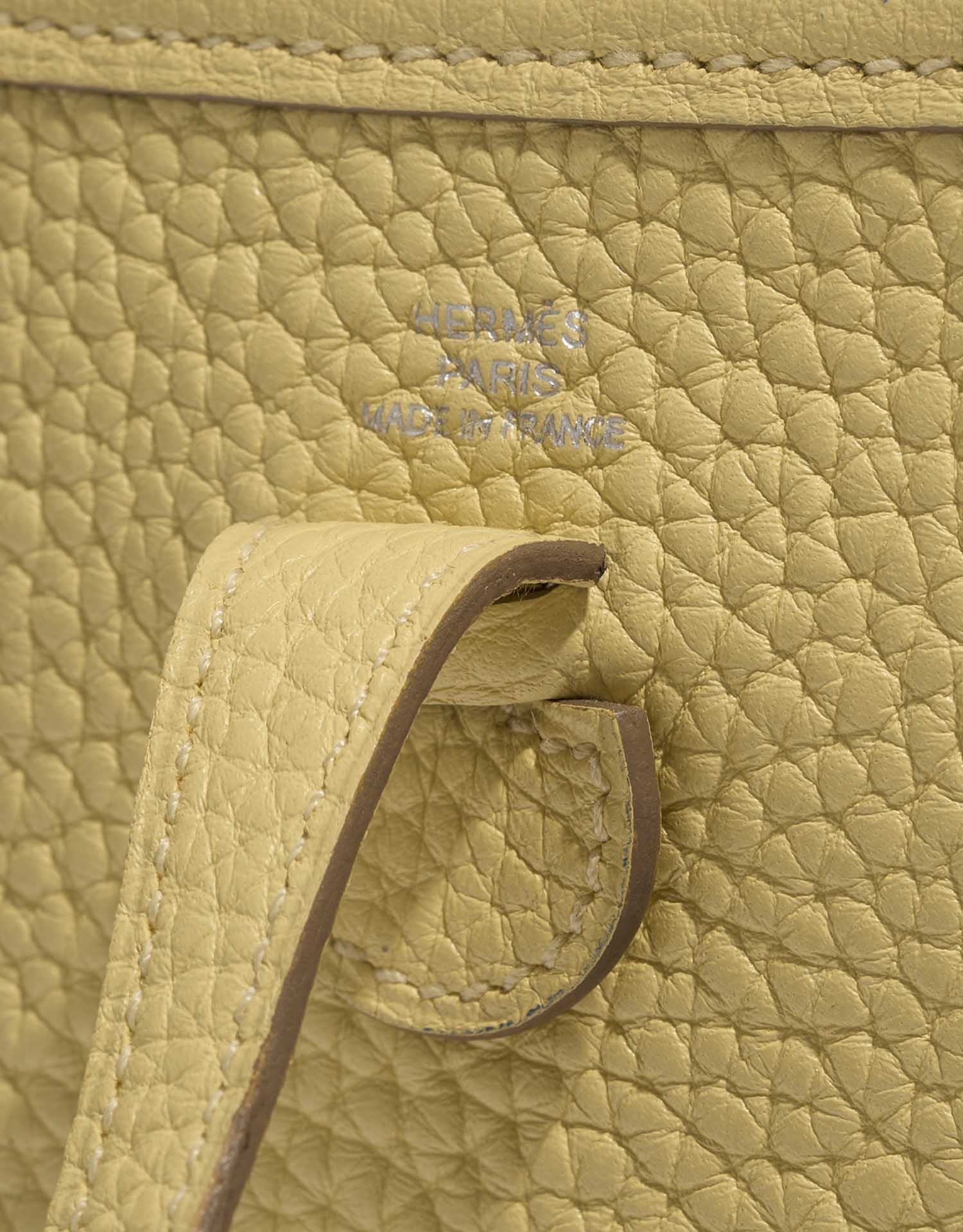 Pre-owned Hermès bag Evelyne 16 Taurillon Clemence Jaune Poussin Yellow Logo | Sell your designer bag on Saclab.com