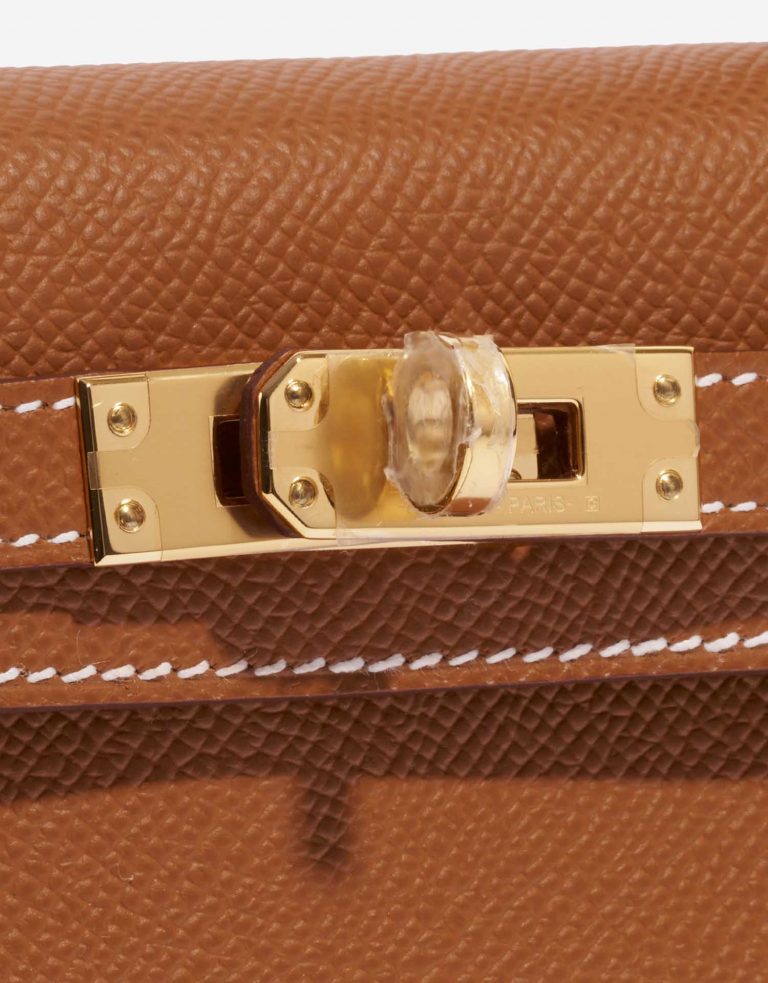 Pre-owned Hermès bag Kelly Mini Epsom Gold Brown Closing System | Sell your designer bag on Saclab.com