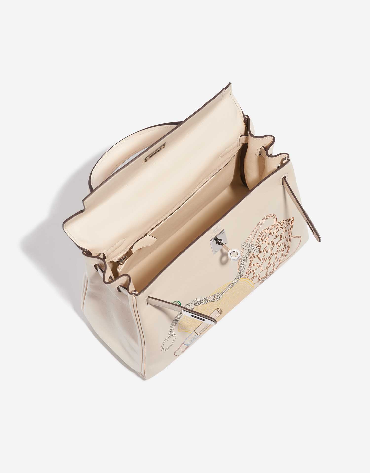 Hermès KellyInAndOut 25 Nata Inside  | Sell your designer bag on Saclab.com