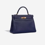 Hermès Kelly 32 BlueEncre Side Front  | Sell your designer bag on Saclab.com