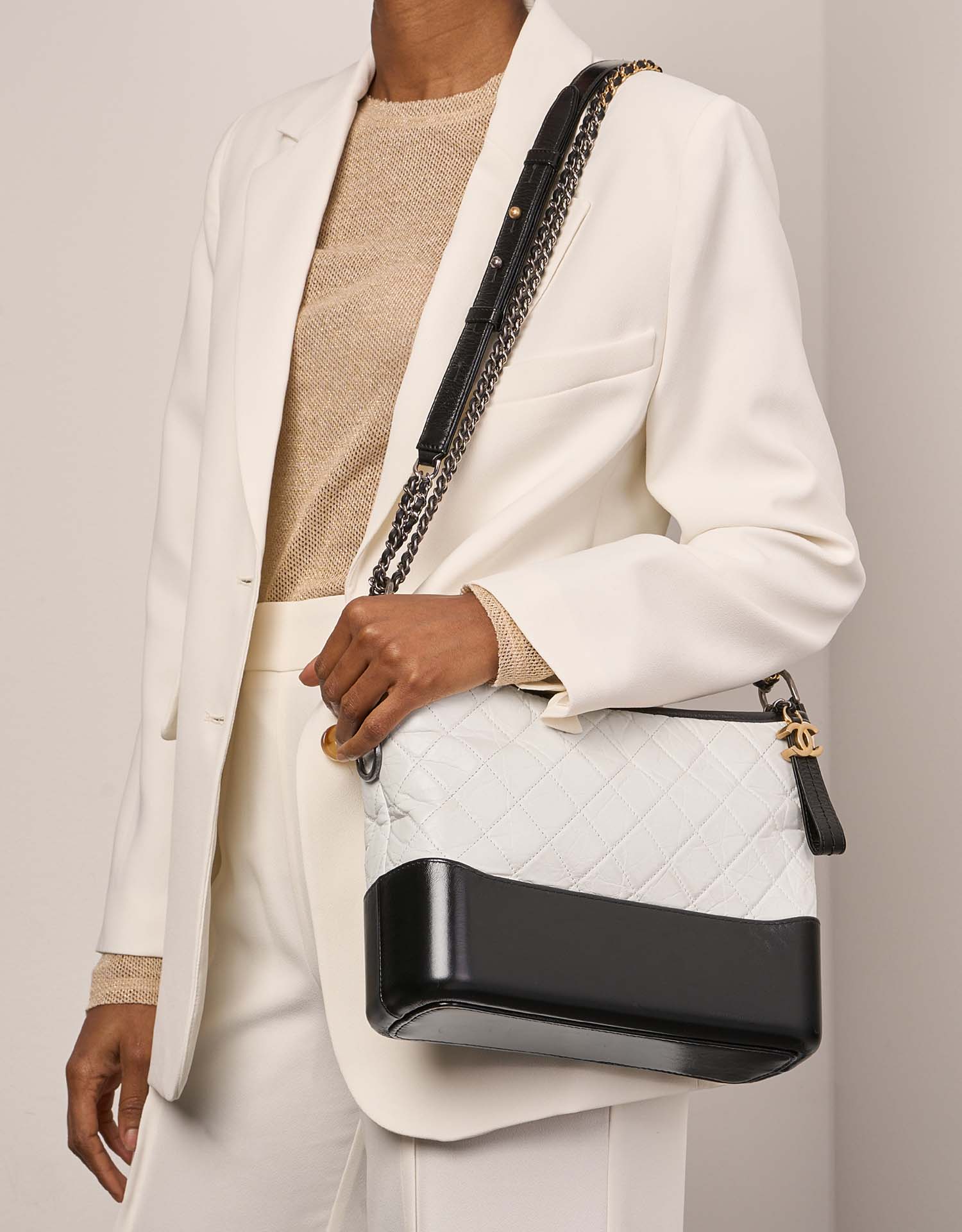 Pre-owned Chanel bag Gabrielle Medium Calf Black / White Black, Multicolour, White Model | Sell your designer bag on Saclab.com