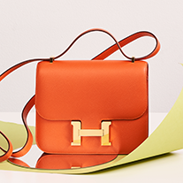 HERMES Orange Shopping Bag Charm Feu/ Gold *New - Timeless Luxuries