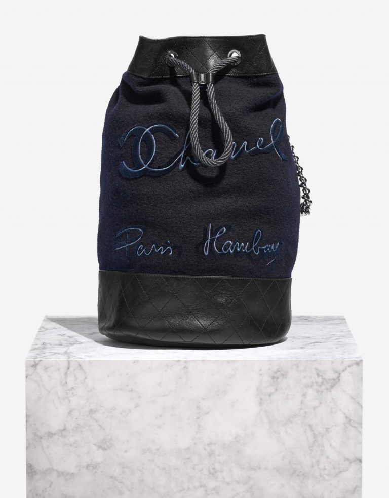 Pre-owned Chanel bag Backpack Wool / Lamb Blue / Black Black | Sell your designer bag on Saclab.com