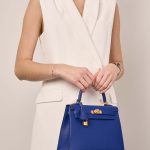 Hermès Kelly 25 BleuRoyal Sizes Worn | Sell your designer bag on Saclab.com