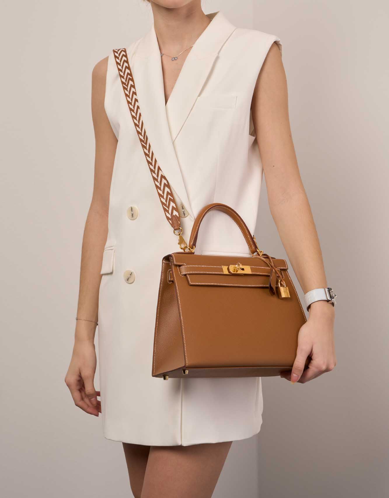 White leather and canvas with gold plated hardware handbag, Kelly