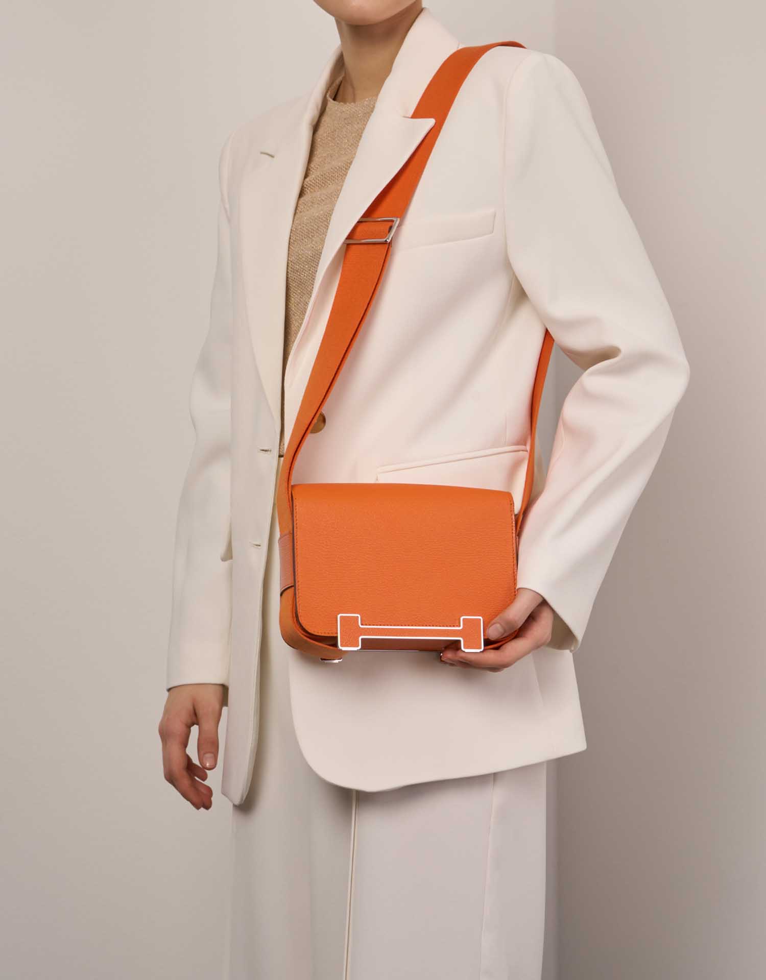 Hermès Geta Orange Sizes Worn | Sell your designer bag on Saclab.com