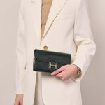 Hermès Constance LongWallet VertFonce-Ombre Sizes Worn | Sell your designer bag on Saclab.com