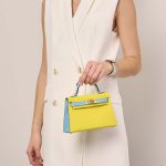 Hermès Kelly Mini Lime-BlueAztec Sizes Worn | Sell your designer bag on Saclab.com
