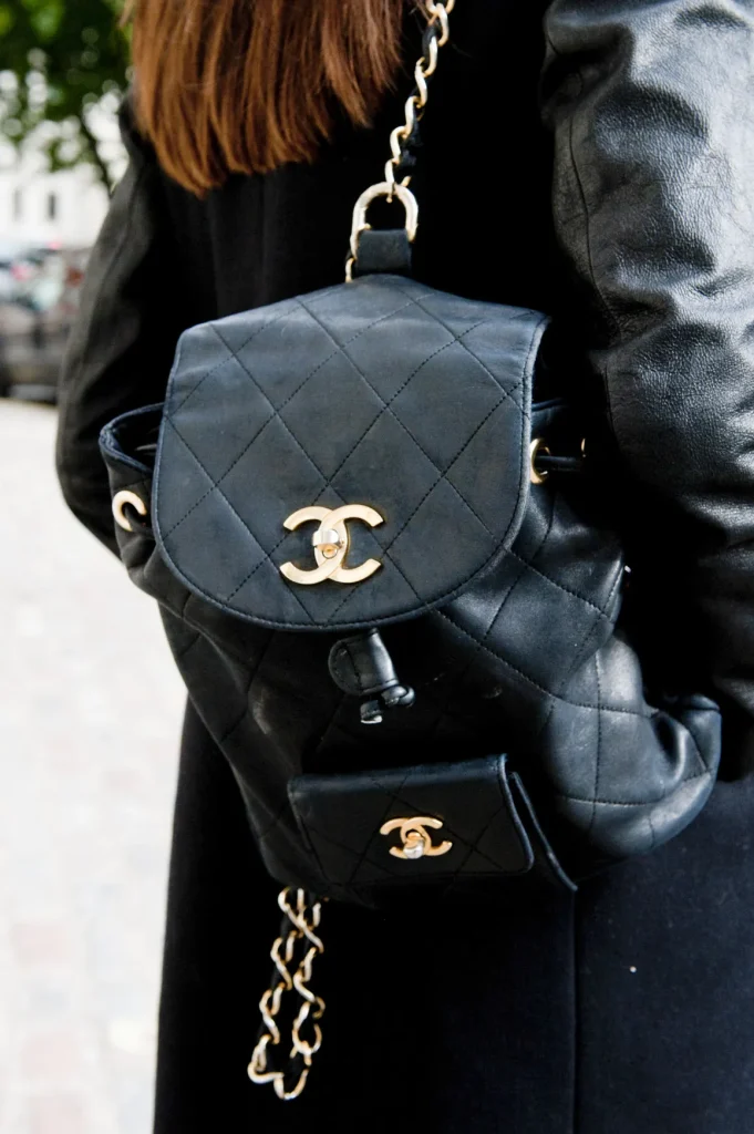 beige chanel backpack black
