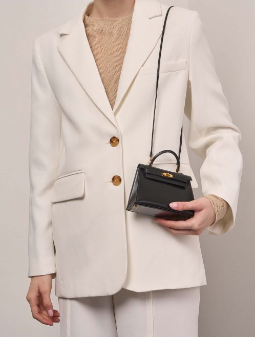 Hermès Kelly 15 Black 1M | Sell your designer bag on Saclab.com