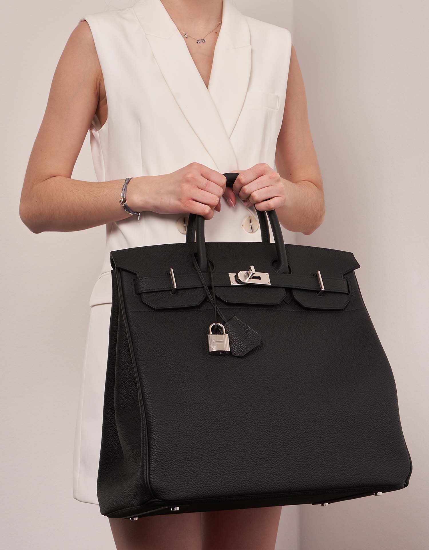 Hermès HautACourroies 40 Black 1M | Sell your designer bag on Saclab.com