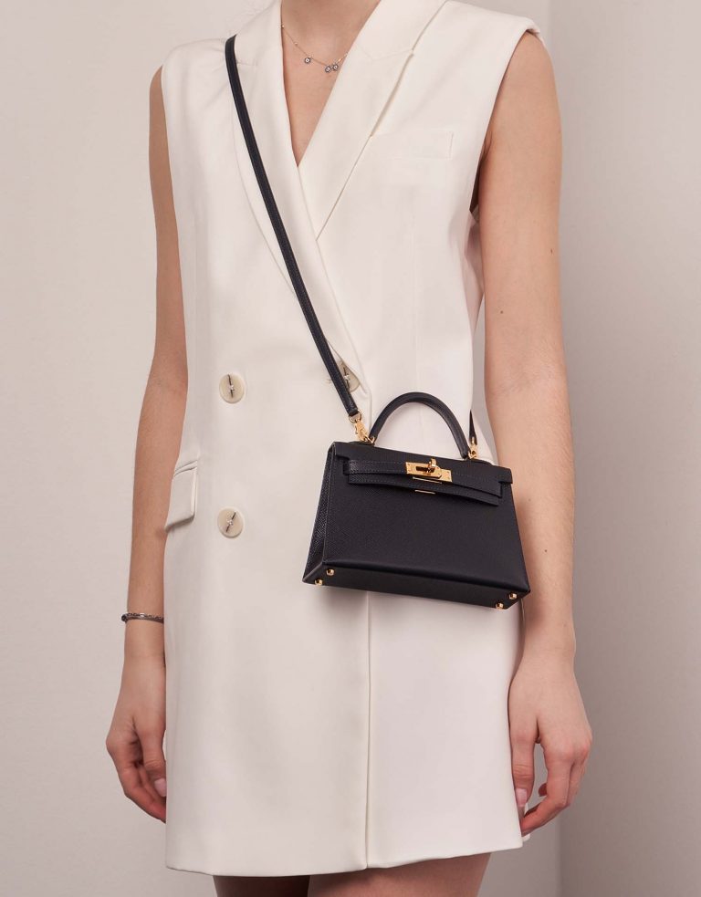 Hermès Kelly Mini BlueIndigo Sizes Worn | Sell your designer bag on Saclab.com