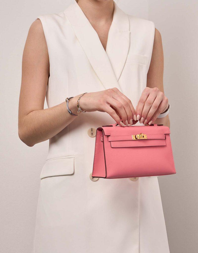 Hermès Kelly Pochette RoseAzalee Sizes Worn | Sell your designer bag on Saclab.com