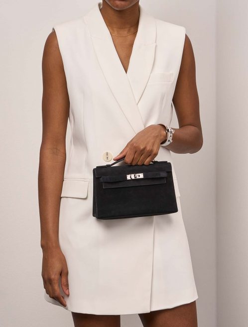 Hermès Kelly Pochette Black 1M | Sell your designer bag on Saclab.com