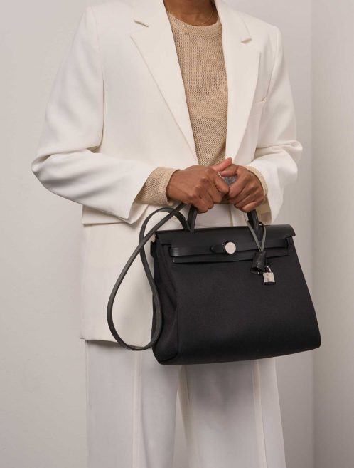 Pre-owned Hermès bag Herbag 31 Toile / Vache Hunter Black Black | Sell your designer bag on Saclab.com