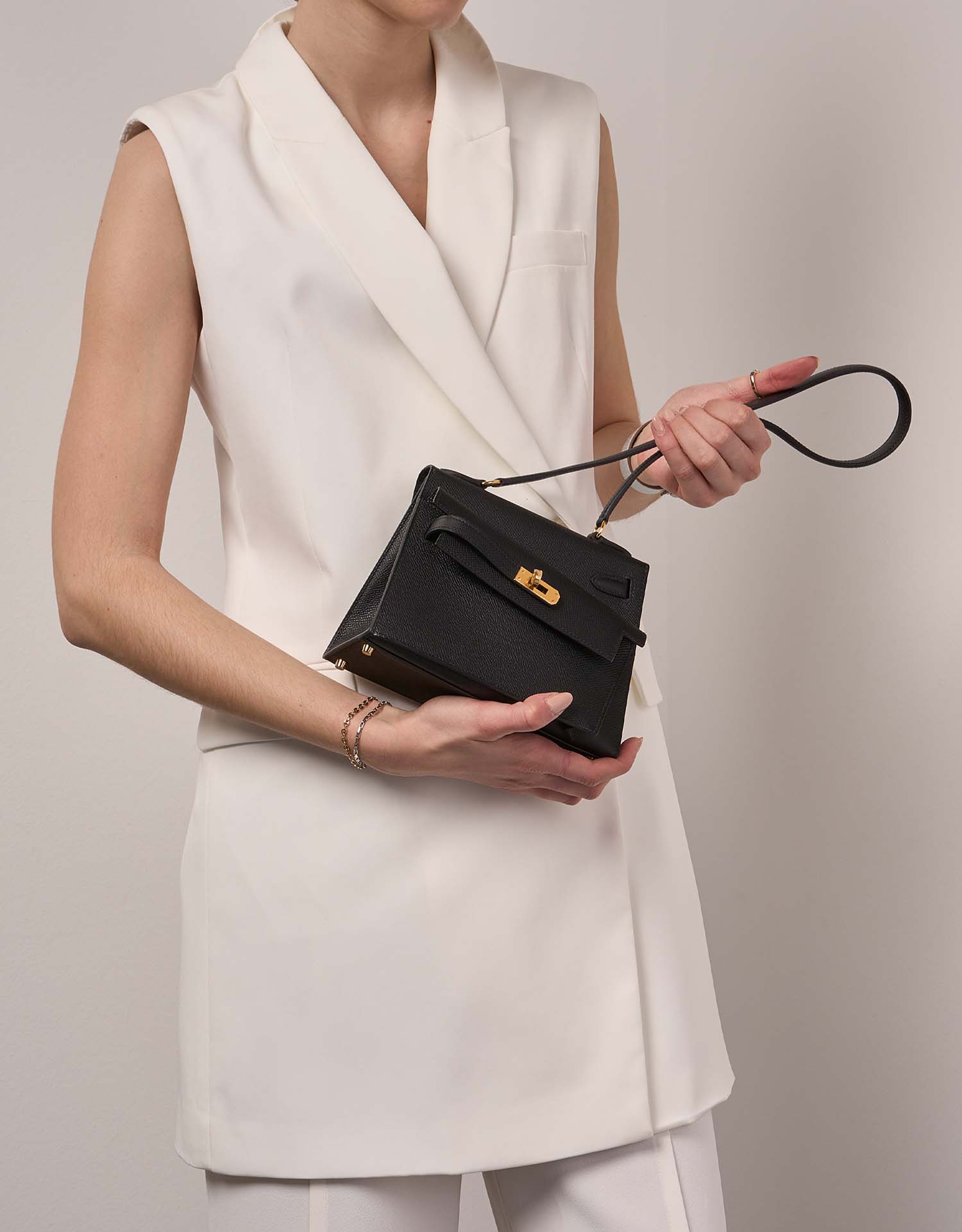 Hermès Kelly 20Disorder Black 1M | Sell your designer bag on Saclab.com