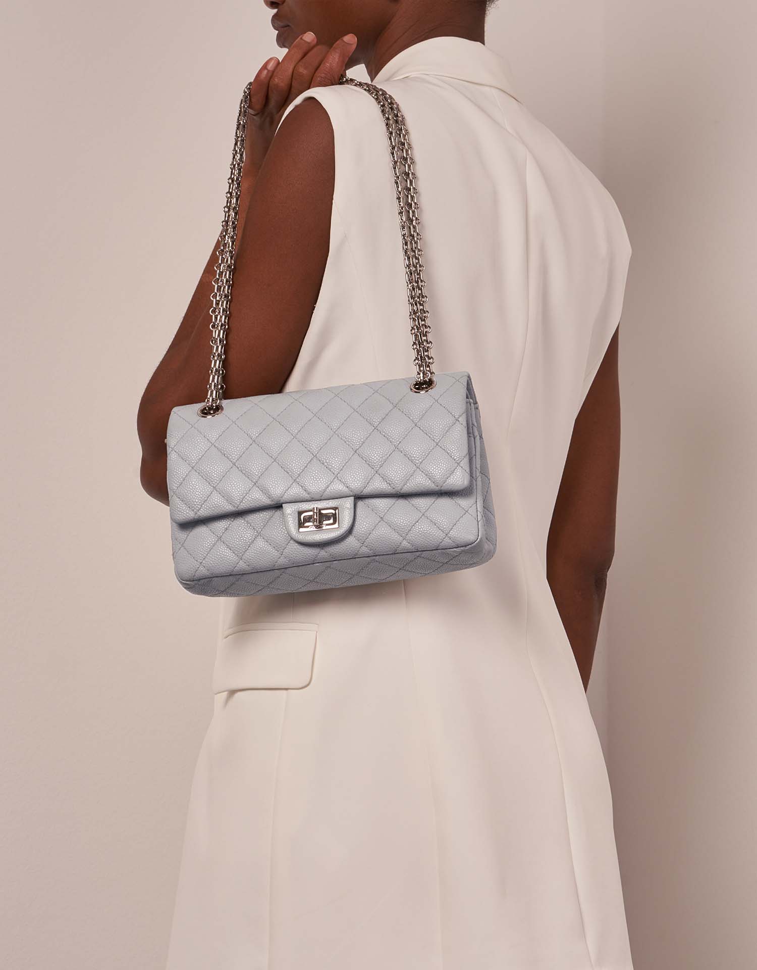 Chanel 255Reissue 225 LightBlue Sizes Worn | Sell your designer bag on Saclab.com