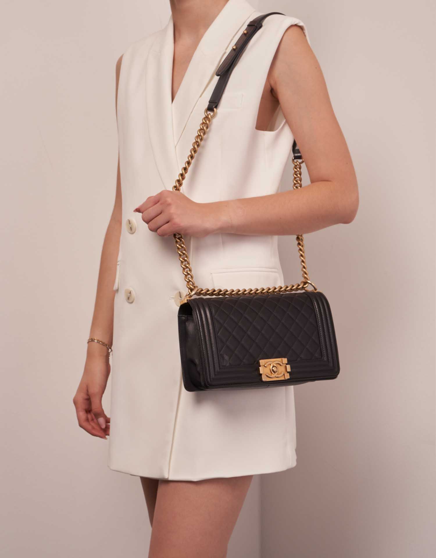 Pre-owned Chanel bag Boy Old Medium Dark Plume Black Model | Sell your designer bag on Saclab.com