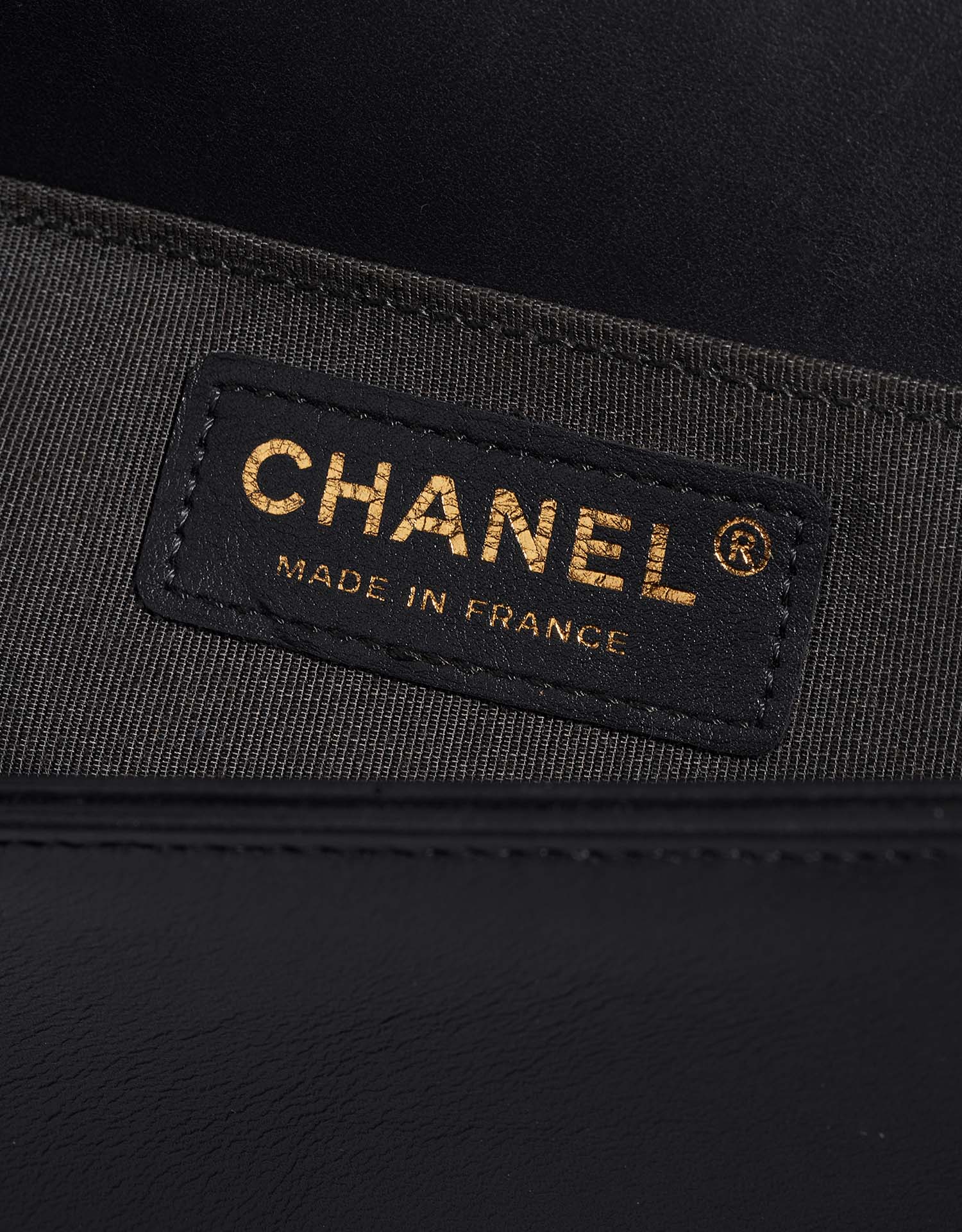 Pre-owned Chanel bag Boy Old Medium Dark Plume Black Logo | Sell your designer bag on Saclab.com
