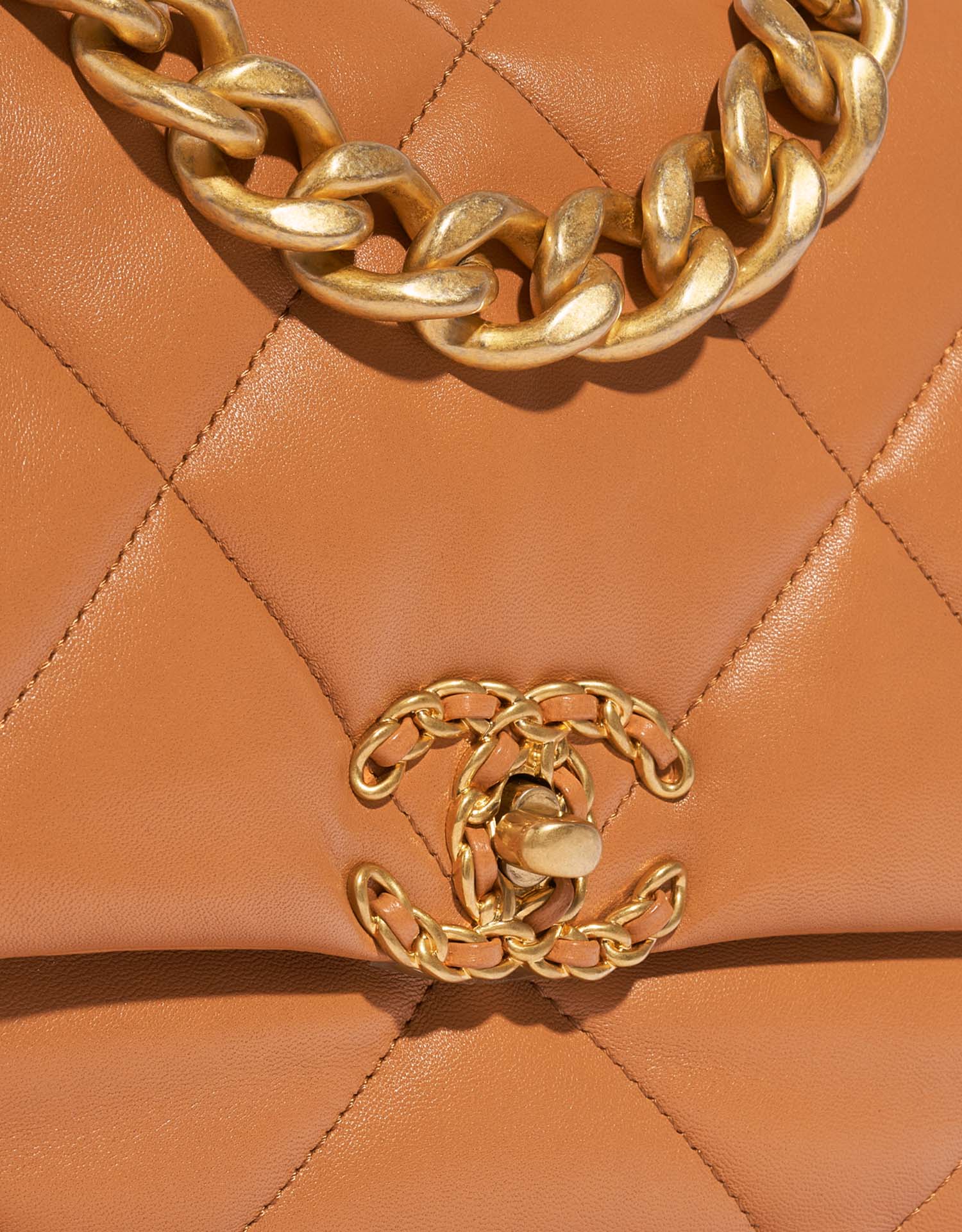 Chanel 19 Large Flap Bag Cognac Closing System  | Sell your designer bag on Saclab.com