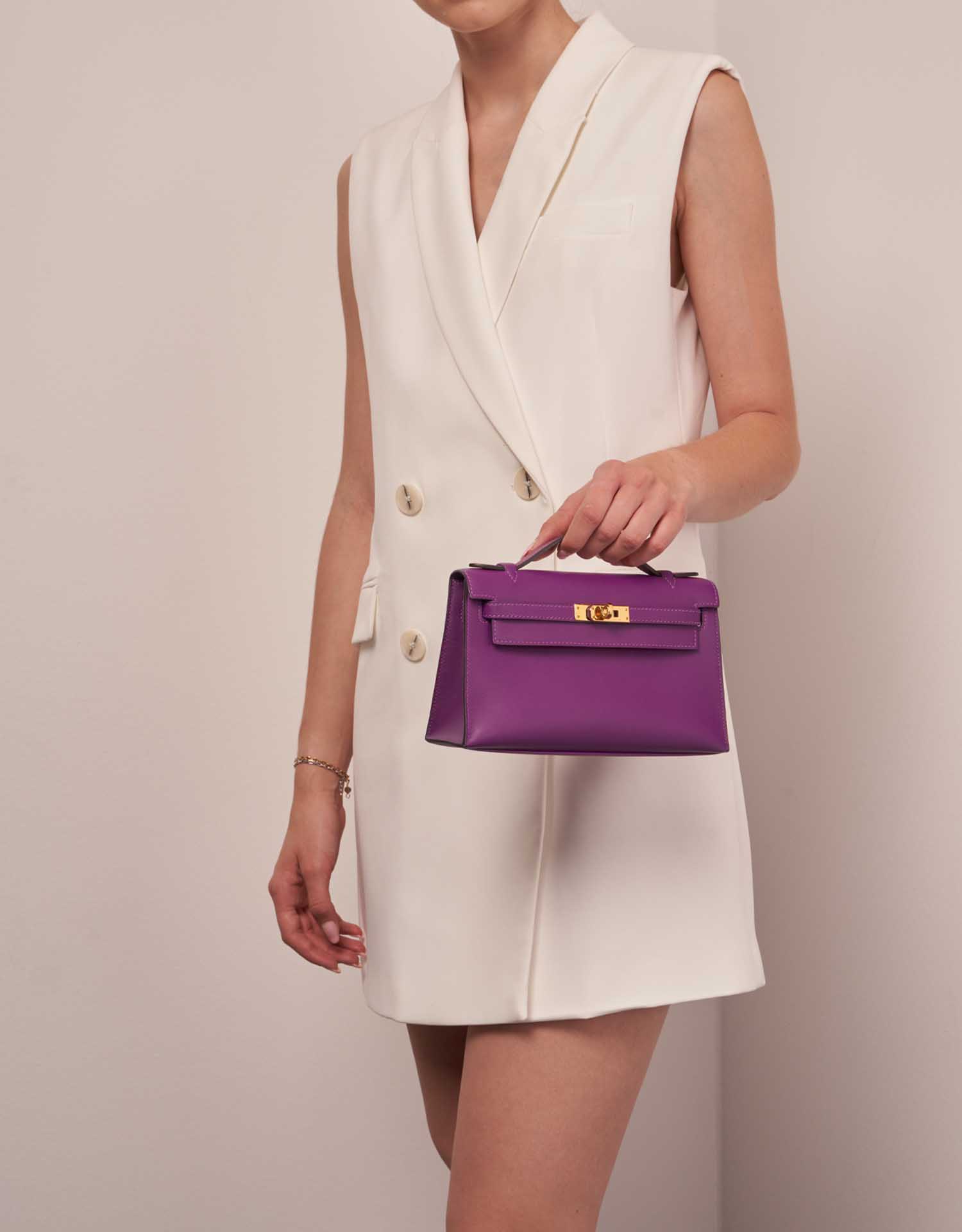 Hermès Kelly Pochette Anemone Sizes Worn | Sell your designer bag on Saclab.com