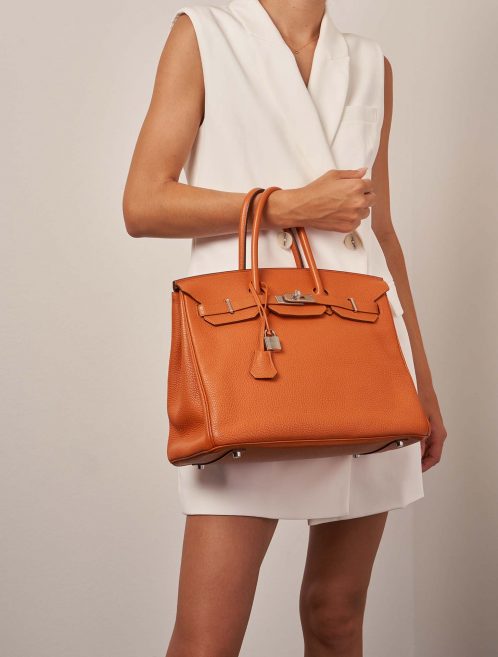Hermès Birkin 35 Orange Sizes Worn | Sell your designer bag on Saclab.com