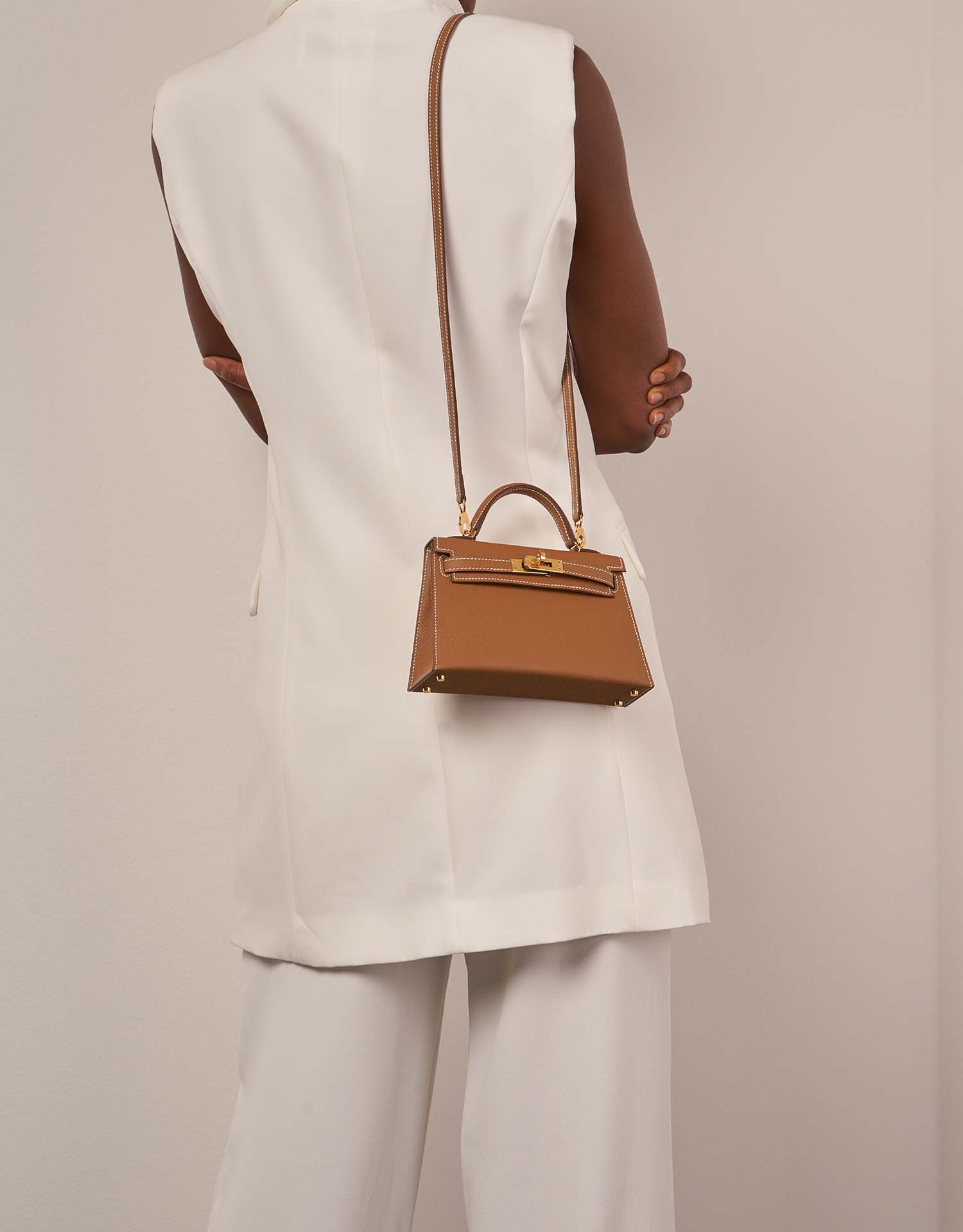 Hermès Kelly Mini Gold Sizes Worn | Sell your designer bag on Saclab.com