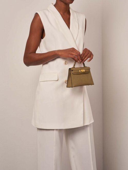 Hermès Kelly Mini Kraft  Sizes Worn | Sell your designer bag on Saclab.com