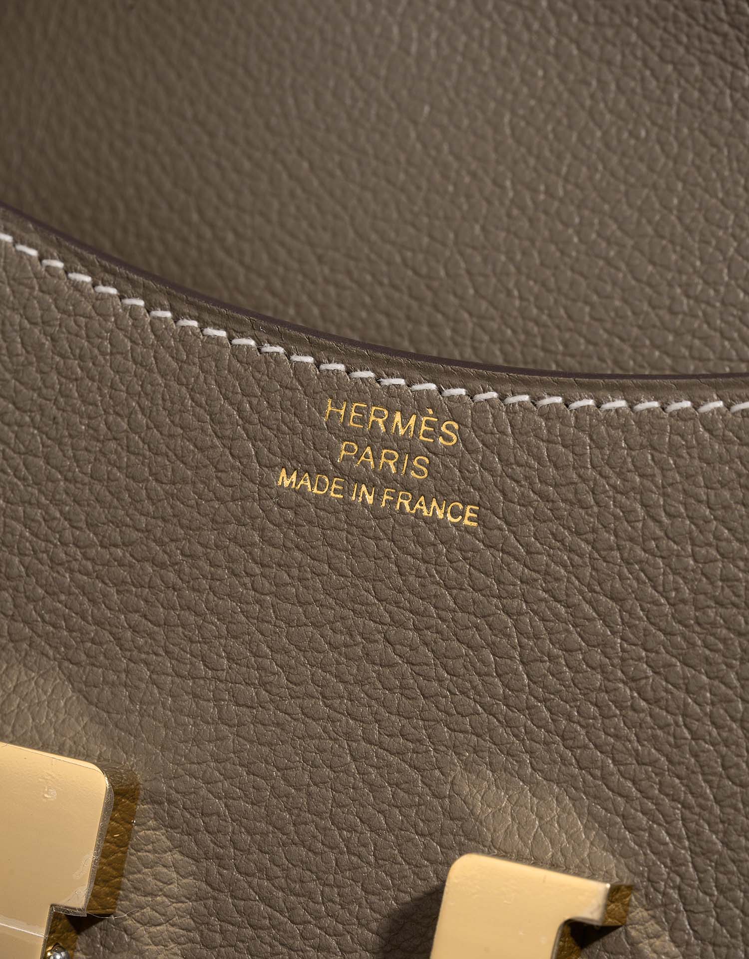 Hermès ConstanceSlimWallet Etoupe Logo  | Sell your designer bag on Saclab.com