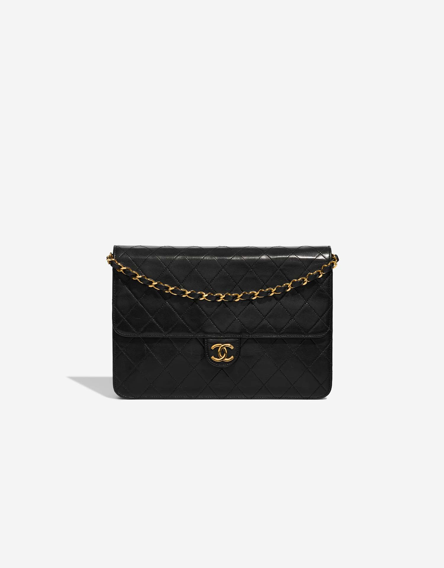 chanel black and gold clutch bag