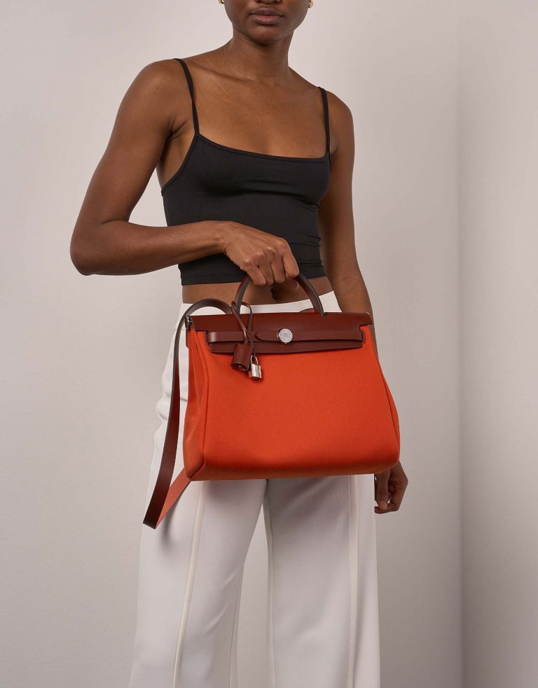 Pre-owned Hermès bag Herbag 31 Toile / Vache Hunter Orange Mécano / Rouge H Orange | Sell your designer bag on Saclab.com