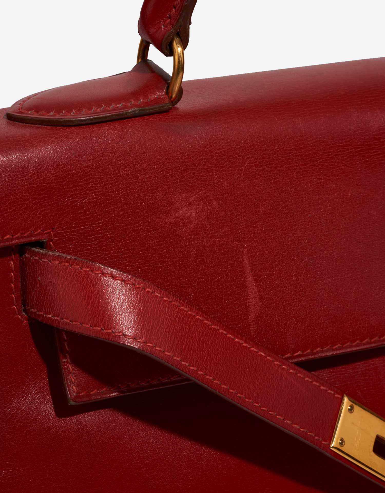 Hermès Kelly 32 RougeCasaque signs of wear | Sell your designer bag on Saclab.com