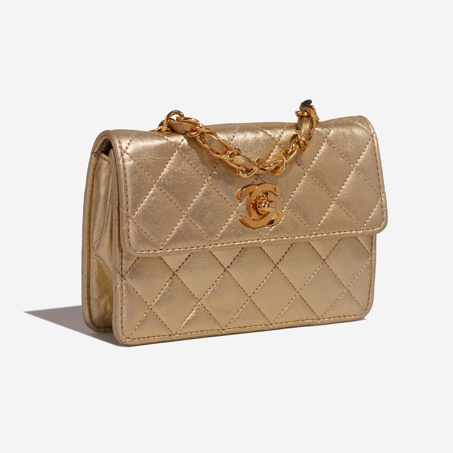 Chanel Timeless ExtraMini Gold Side Front | Verkaufen Sie Ihre Designer-Tasche auf Saclab.com