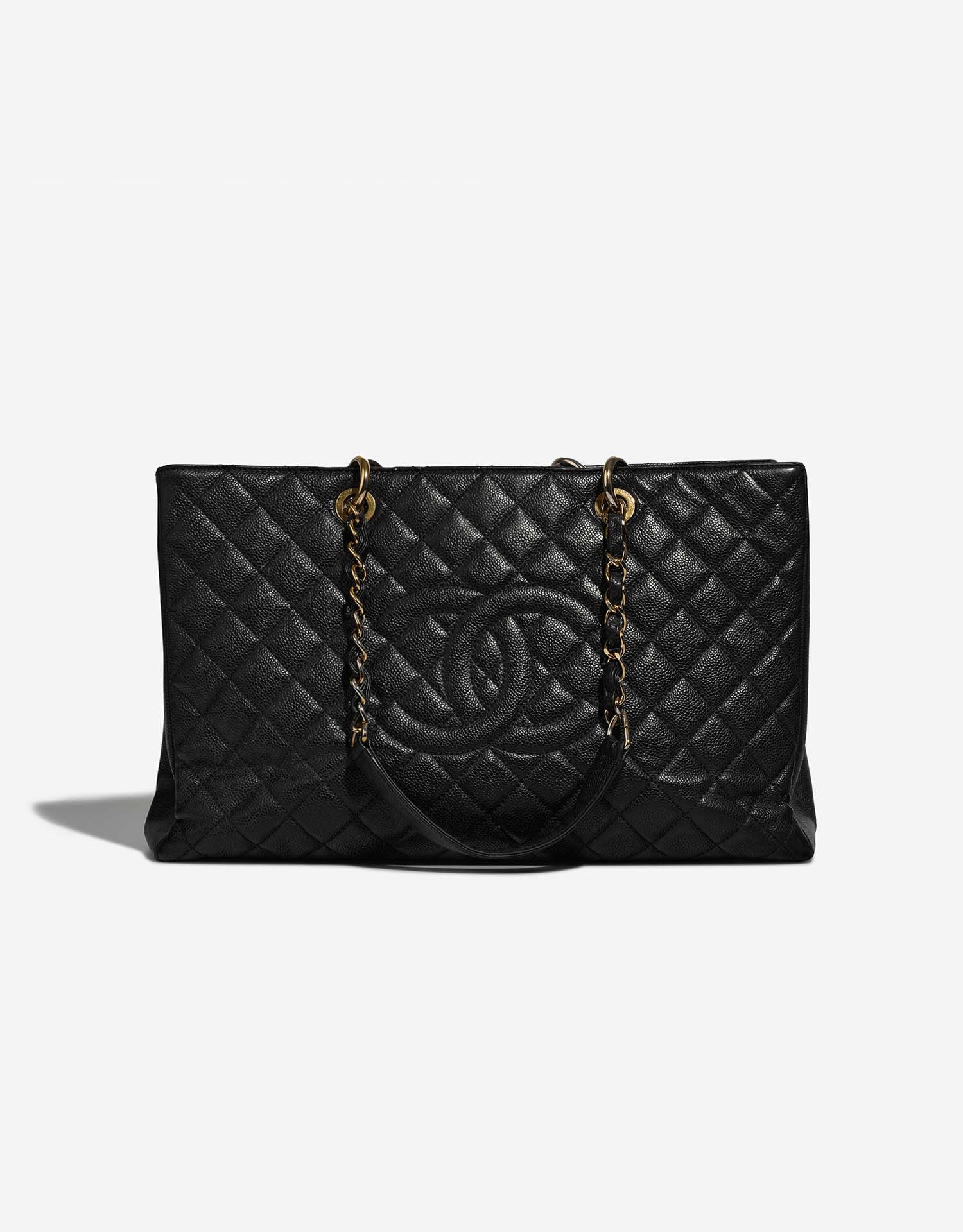 Authentic CHANEL caviar leather travel bag black