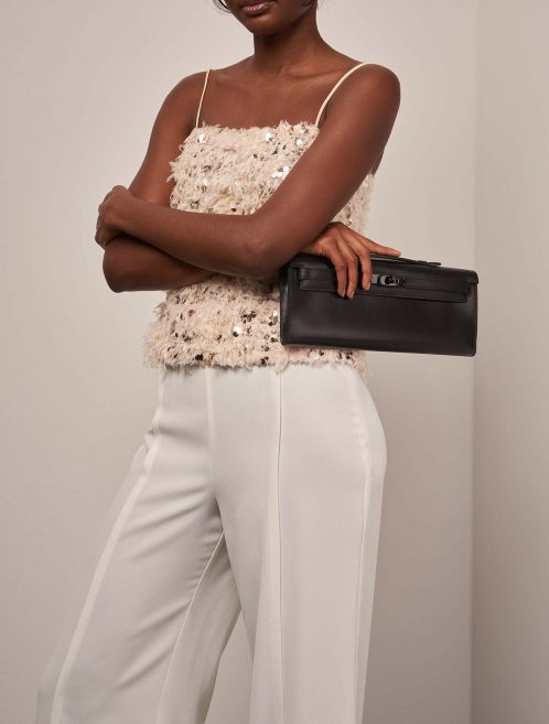 Hermès KellyCutClutch  Soblack on Model | Sell your designer bag on Saclab.com