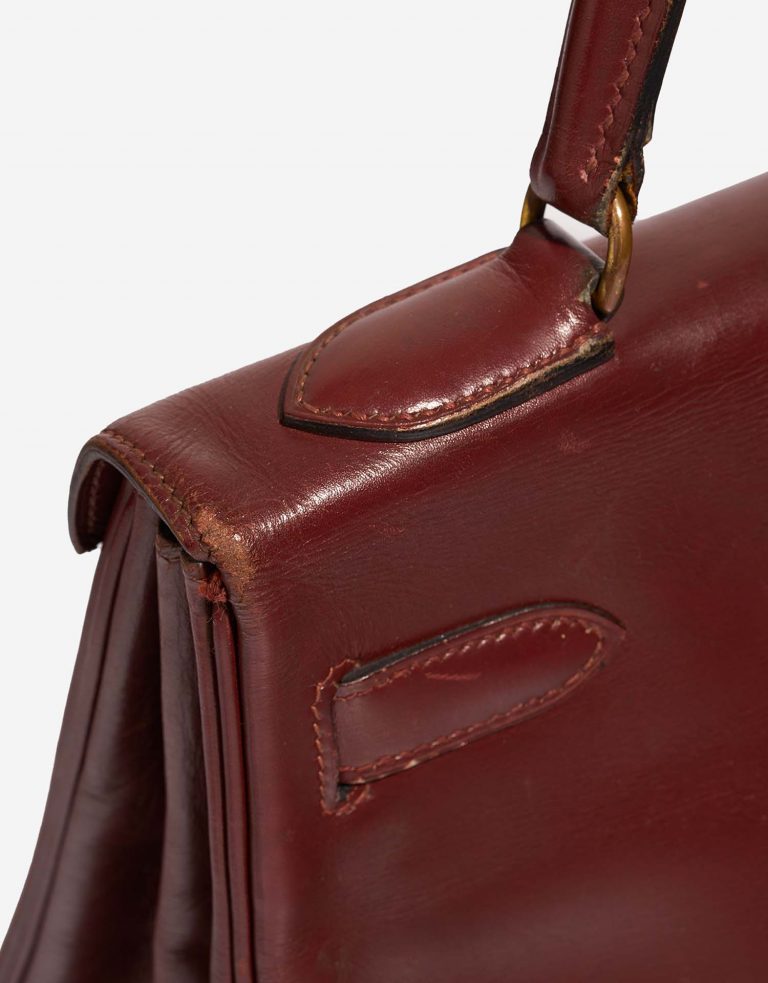 Hermès Kelly 32 RougeH signs of wear| Sell your designer bag on Saclab.com