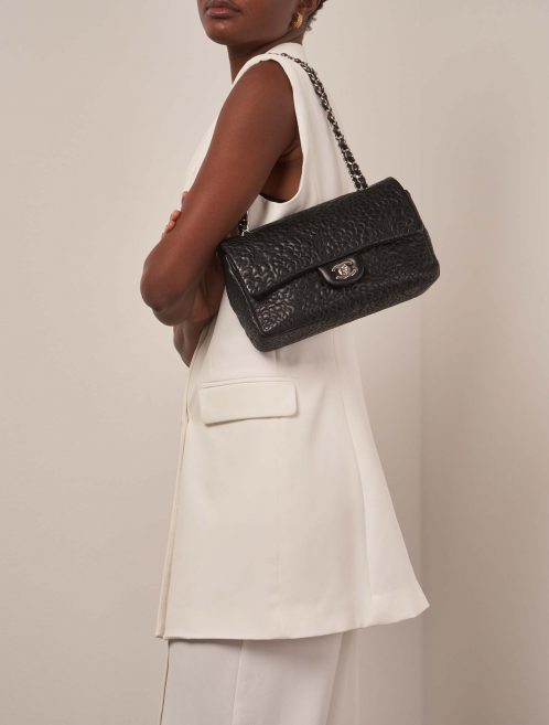 Chanel Timeless Medium Black on Model | Sell your designer bag on Saclab.com