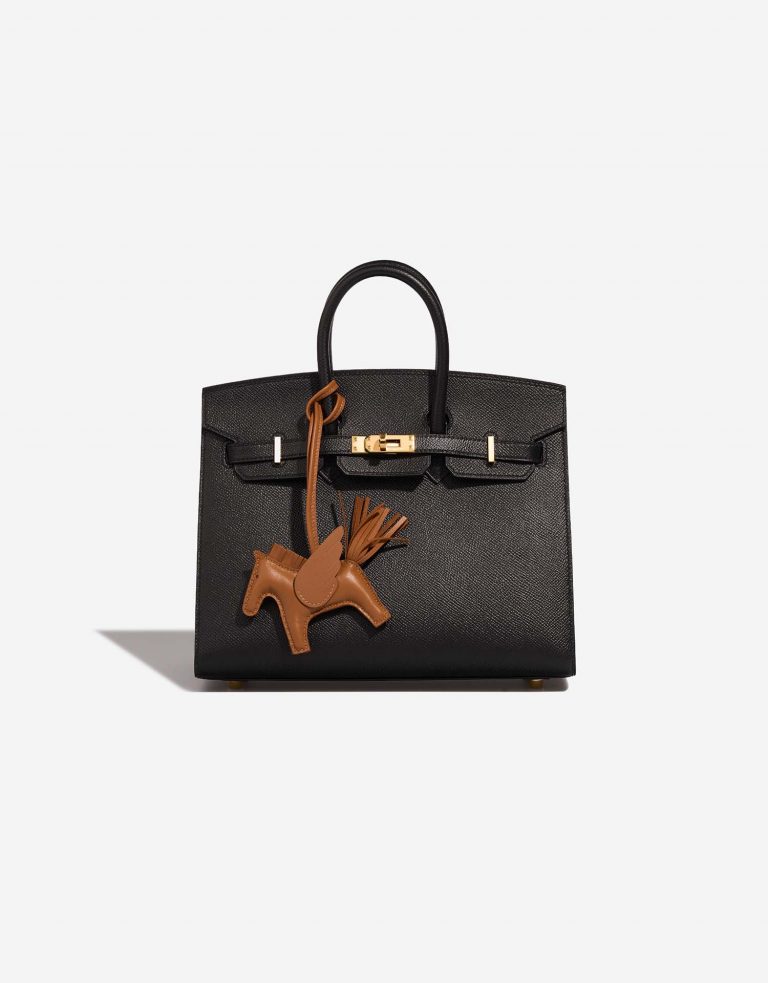 A subtle touch of luxury - this Hermes bag charm is the perfect finish