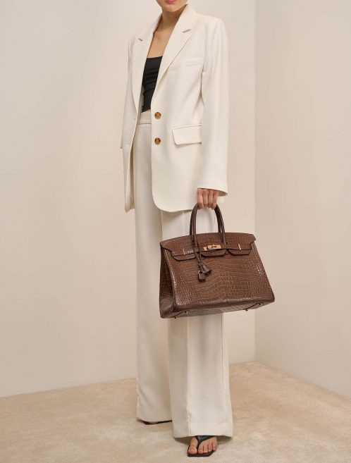 Hermès Birkin 35 MarronDInde auf Model | Verkaufen Sie Ihre Designertasche auf Saclab.com