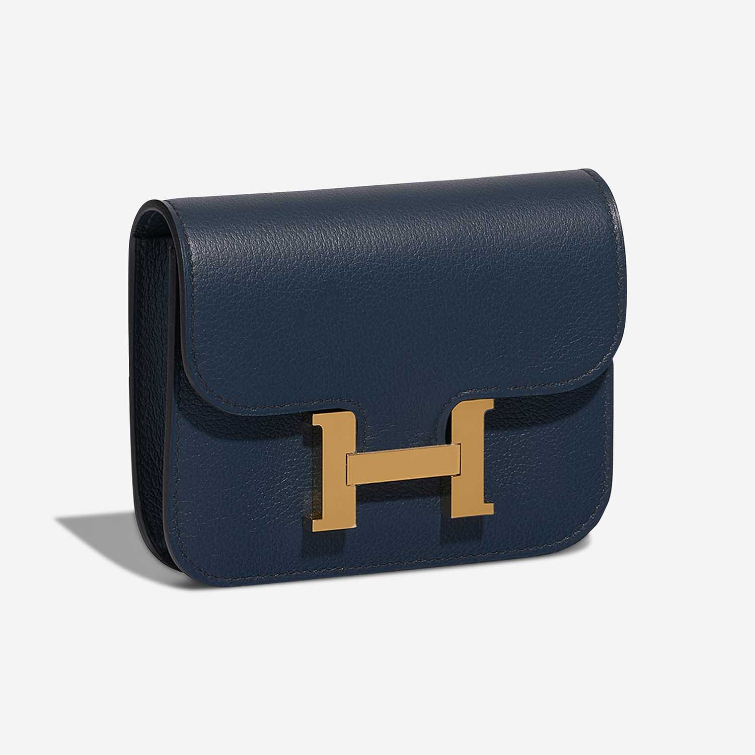 Hermès Constance SlimWallet BleuDePrusse Side Front  | Sell your designer bag on Saclab.com