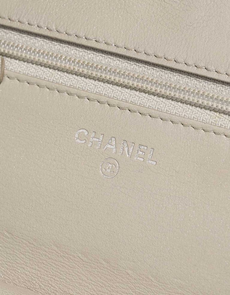 Pre-owned Chanel bag Timeless Wallet On Chain Caviar Shiny Champagne Beige, White | Sell your designer bag on Saclab.com