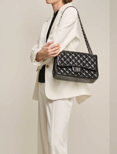 Chanel Timeless Jumbo Black on Model | Sell your designer bag on Saclab.com