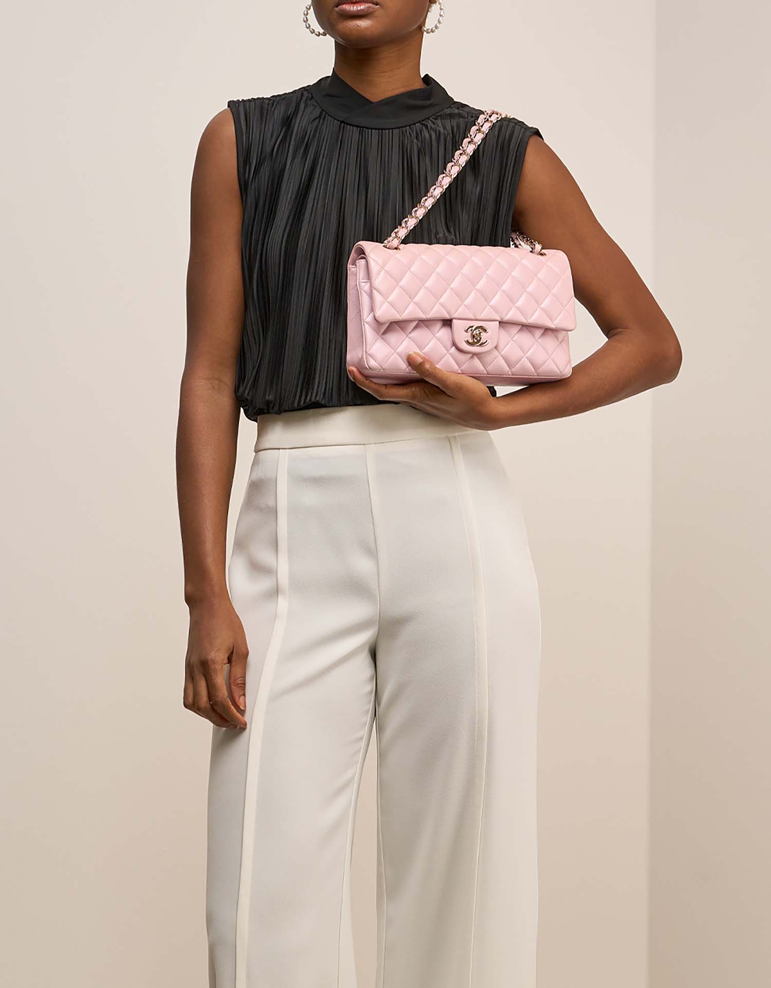Chanel Timeless Medium LightPink on Model | Sell your designer bag on Saclab.com