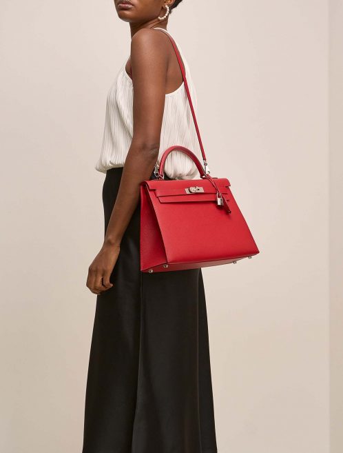 Hermès Kelly 32 RougeCasaque on Model | Sell your designer bag on Saclab.com