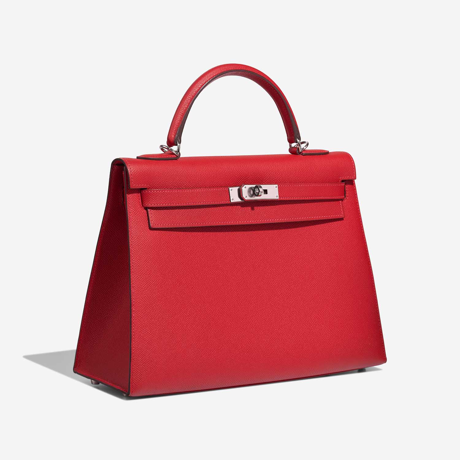 Hermès Kelly 32 RougeCasaque Side Front | Verkaufen Sie Ihre Designer-Tasche auf Saclab.com