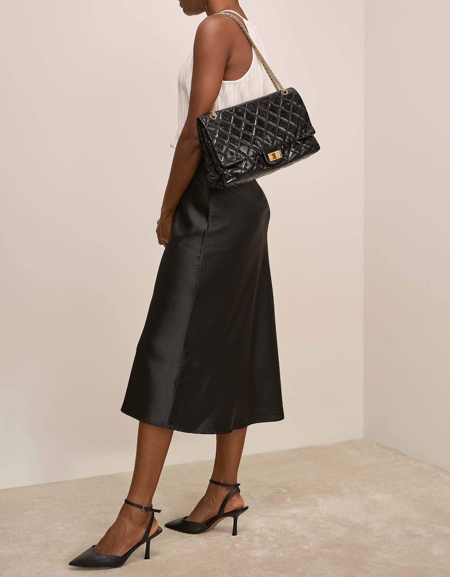 Chanel 255Reissue Noir sur Modèle | Vendez votre sac de créateur sur Saclab.com