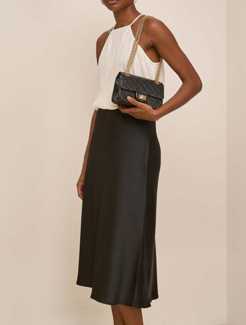 Chanel 255Reissue 224 Black on Model | Sell your designer bag on Saclab.com
