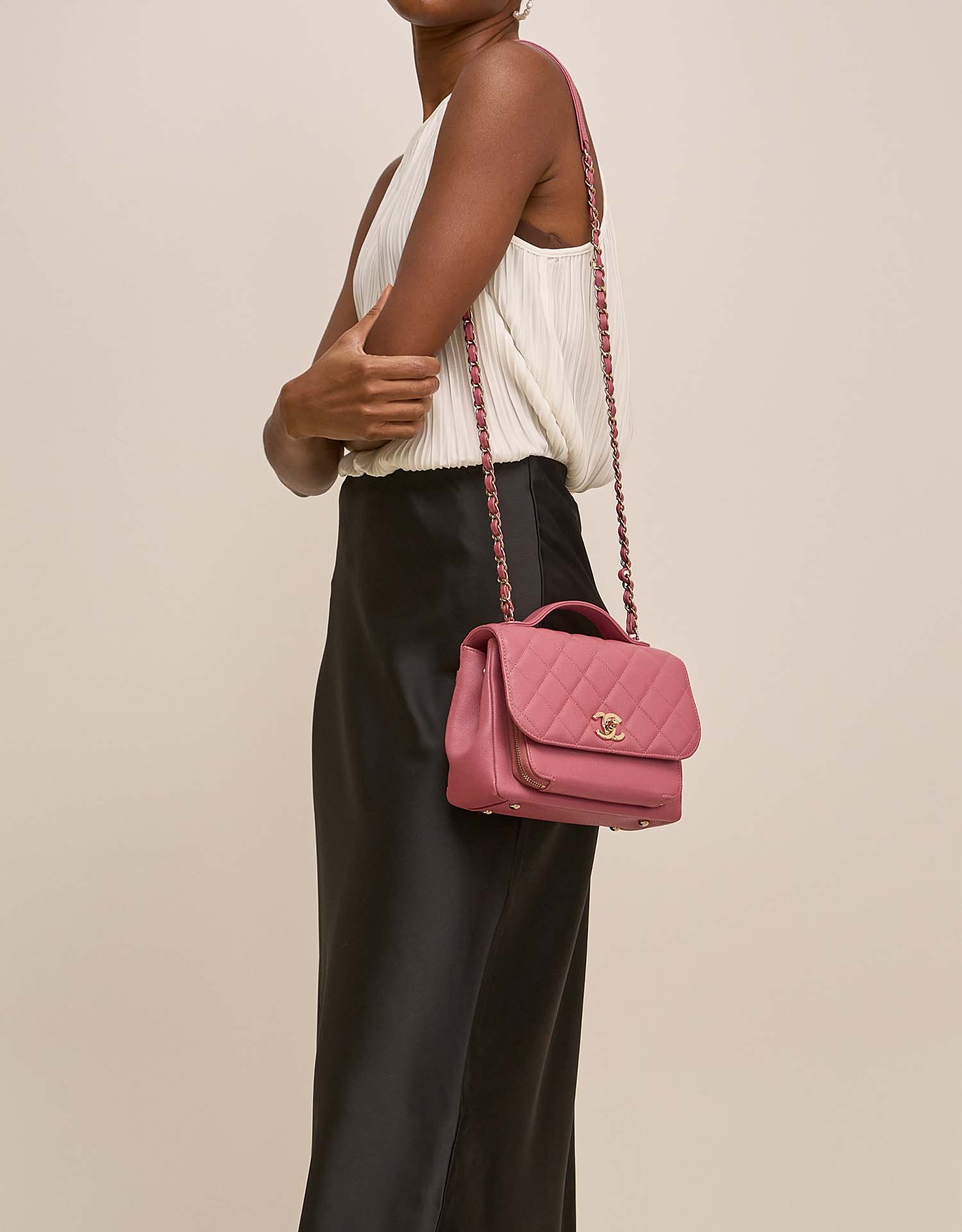 Chanel Business Affinity Medium Coral Pink on Model | Sell your designer bag on Saclab.com